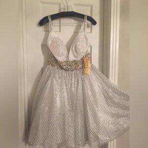 White Coctail dress by MNM Couture. Size 10